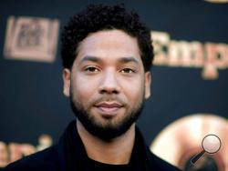 FILE - In this May 20, 2016 file photo, actor and singer Jussie Smollett attends the "Empire" FYC Event in Los Angeles. A police official says "Empire" actor is now considered a suspect "for filing a false police report" and that detectives are presenting the case against him to a grand jury. Smollett told police he was attacked by two masked men while walking home from a Subway sandwich shop at around 2 a.m. on Jan. 29. He says they beat him, hurled racist and homophobic insults at him and looped a rope ar