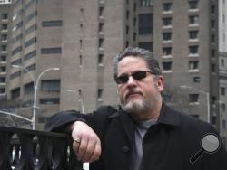 Jack Donson, president of New York-based My Federal Prison Consultant and a retired federal Bureau of Prisons employee, outside Manhattan Correctional Center, right, where he's consulted with inmate clients, Friday March 1, 2019, in New York. Donson welcomes recent criminal indictments exposing shady dealings in the largely unregulated industry of "prison consultants." (AP Photo/Bebeto Matthews)