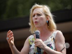 FILE - In this Aug. 10, 2019, file photo, Democratic presidential candidate Sen. Kirsten Gillibrand, D-N.Y., speaks at the Iowa State Fair in Des Moines, Iowa. Gillibrand says she's dropping out of 2020 presidential race amid low polling, fundraising struggles. (AP Photo/John Locher, File)