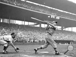 FILE - In this 1936, file photo, Johnny Mize of the St. Louis Cardinals swings during a baseball game. (AP Photo/File)