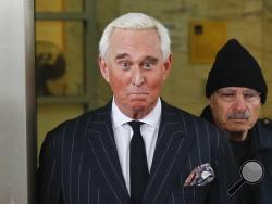 FILE - In this Feb. 1, 2019 file photo, former campaign adviser for President Donald Trump, Roger Stone, leaves federal court in Washington. The Justice Department said Tuesday it will take the extraordinary step of lowering the amount of prison time it will seek for Roger Stone, an announcement that came just hours after President Donald Trump complained that the recommended sentence for his longtime ally and confidant was “very horrible and unfair." (AP Photo/Pablo Martinez Monsivais)