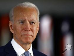 Democratic presidential candidate former Vice President Joe Biden speaks to members of the press at the National Constitution Center in Philadelphia, Tuesday, March 10, 2020. (AP Photo/Matt Rourke)