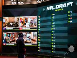 In a photo provided by ESPN Images, the draft board is seen before the start of the NFL football draft, Thursday, April 23, 2020, in Bristol, Conn. (Allen Kee/ESPN Images via AP)