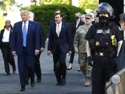 FILE - In this June 1, 2020, file photo President Donald Trump departs the White House to visit outside St. John's Church in Washington. (AP Photo/Patrick Semansky, File)