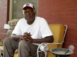 Gerald Armstrong recalls his time working for the old Kansas City Athletics as an attendant and ball boy in the visitor's clubhouse as he speaks from the front porch of the home where he grew up and now lives in Kansas City, Mo., on Friday, June 26, 2020. Armstrong is one of more than a dozen Black men who said they were sexually molested by former Red Sox clubhouse manager Donald "Fitzy" Fitzpatrick when they were youths. (AP Photo/Charlie Riedel)