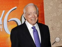 FILE - This Jan. 12, 2012 file photo shows Hugh Downs at the "Today" show 60th anniversary celebration in New York. Downs, a genial and near-constant presence on television from the 1950s through the 1990s, has died. His family said Downs died of natural causes Wednesday, July 1, 2020, in Scottsdale, Ariz. He was 99. Downs was a host of the ‘Today’ show on NBC, worked on the ‘Tonight’ show when Jack Paar was in charge, and hosted the long-running game show "Concentration." (AP Photo/Evan Agostini, File)
