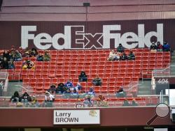 FILE - In this Dec. 9, 2018, file photo, FedEx Field is less than full during the second half of an NFL football game between the Washington Redskins and the New York Giants in Landover, Md. The title sponsor of the Redskins’ stadium wants them to change their name. FedEx said in a statement Thursday, July 2, 2020, “We have communicated to the team in Washington our request that they change the team name.“ (AP Photo/Mark Tenally, File)