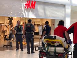 Authorities continue their investigation of a shooting at Riverchase Galleria shopping mall, Friday, July 3, 2020, in Hoover, Ala., that left an 8-year-old boy dead and three other people hospitalized. (Carol Robinson/The Birmingham News via AP)