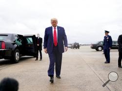 President Donald Trump walks towards the media to speak before boarding Air Force One for a trip to Kenosha, Wis., Tuesday, Sept. 1, 2020, in Andrews Air Force Base, Md. (AP Photo/Evan Vucci)