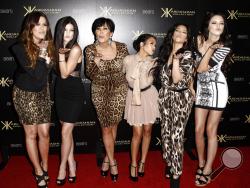 FILE - In this Aug. 17, 2011 file photo, from left, Khloe Kardashian, Kylie Jenner, Kris Jenner, Kourtney Kardashian, Kim Kardashian, and Kendall Jenner arrive at the Kardashian Kollection launch party in Los Angeles. After more than a decade, “Keeping Up With the Kardashians” is ending its run.“It is with heavy hearts that we say goodbye" to the reality show, Kim Kardashian and other members of the extended Kardashian-Jenner family said in a statement Tuesday, Sept. 8, 2020. (AP Photo/Matt Sayles, file)
