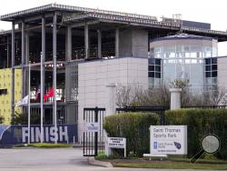 The entrance to the Tennessee Titans' practice facility is shown Tuesday, Sept. 29, 2020, in Nashville, Tenn. The Titans suspended in-person activities through Friday after the NFL said three Titans players and five personnel tested positive for the coronavirus, becoming the first COVID-19 outbreak of the NFL season in Week 4. The facility is now closed for four days to help limit the spread of the virus. (AP Photo/Mark Humphrey)