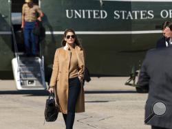 Counselor to the President Hope Hicks walks from Marine One to accompany President Donald Trump aboard Air Force One as he departs Wednesday, Sept. 30, 2020, at Andrews Air Force Base, Md. (AP Photo/Alex Brandon)