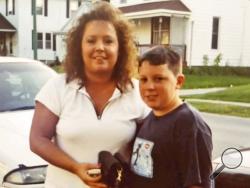 This undated photo provided by Diane Urban, shows her and her son Jordan Garmatter. After watching President Donald Trump target the son of former Vice President Joe Biden for his history of substance abuse, Urban, a Republican from Delphos, Ohio, was reminded again of the shame her son lived with during his own battle with addiction. As Trump nears the end of his first term, some supporters, including Urban, feel left behind by his administration's drug policies. (Courtesy of Diane Urban via AP)