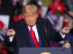 President Donald Trump speaks during a campaign rally at Erie International Airport Tom Ridge Field in Erie, Pa, Tuesday, Oct. 20, 2020. (AP Photo/Gene J. Puskar)