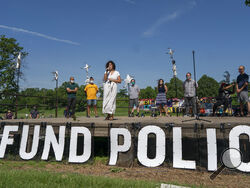  In this June 7, 2020, file photo, Alondra Cano, a City Council member, speaks during "The Path Forward" meeting at Powderhorn Park on Sunday, June 7, 2020, in Minneapolis. On Wednesday, Dec. 8, 2020, the Minneapolis City Council will decide whether to shrink the city's police department while violent crime is already soaring and redirect funding toward alternatives for reducing violence. (Jerry Holt/Star Tribune via AP, File)