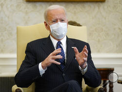 In this Feb. 9, 2021, photo, President Joe Biden meets with business leaders to discuss a coronavirus relief package in the Oval Office of the White House in Washington. Republicans are attacking the Democrats’ $1.9 trillion COVID-19 relief package as too costly, economically damaging and overtly partisan. It's an all-angles attempt by the GOP to derail Biden’s top priority as it starts moving through a Congress that his party controls only narrowly. (AP Photo/Patrick Semansky)
