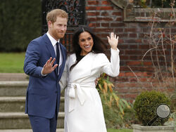 FILE - Britain's Prince Harry and his fiancee Meghan Markle pose for photographers during a photocall in the grounds of Kensington Palace in London, Monday Nov. 27, 2017. The second baby for the Duke and Duchess of Sussex is officially here: Meghan gave birth to a healthy girl on Friday, June 4, 2021. (AP Photo/Matt Dunham, File)