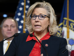 FILE - In this Feb. 13, 2019 file photo, House Republican Conference chair Rep. Liz Cheney, R-Wyo., with House Minority Whip Steve Scalise, R-La., at right, talks to reporters during a news conference at the Capitol in Washington. (AP Photo/J. Scott Applewhite)