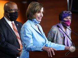 House Speaker Nancy Pelosi of Calif., center, flanked by Rep. Benny Thompson, D-Miss., left, and Rep. Rosa DeLauro, D-Conn., right, talks to reporters on Capitol Hill in Washington, Wednesday, May 19, 2021, about legislation to create an independent, bipartisan commission to investigate the Jan. 6 attack on the United States Capitol Complex. Thompson is chairman of the House Homeland Security Committee and negotiated a bipartisan bill outlining a commission to investigate the Jan. 6 attack on the Capitol. (