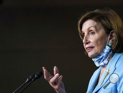 House Speaker Nancy Pelosi of Calif., talks to reporters on Capitol Hill in Washington, Wednesday, May 19, 2021, about legislation to create an independent, bipartisan commission to investigate the Jan. 6 attack on the United States Capitol Complex. (AP Photo/Susan Walsh)