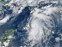 This GOES-16 GeoColor satellite image taken Monday, July 5, 2021, at 4:50 p.m. EDT, and provided by NOAA, shows Tropical Storm Elsa over western Cuba with strong rain and winds. Forecasters say it will move on to the Florida Keys on Tuesday and Florida’s central Gulf coast by Wednesday. The storm is moving over mainly rural areas to the east of Havana on Monday after making landfall near Cienega de Zapata, a natural park with few inhabitants. (NOAA via AP)