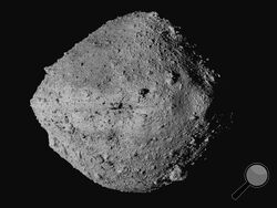 FILE - This undated image made available by NASA shows the asteroid Bennu from the OSIRIS-REx spacecraft. On Wednesday, Aug. 11, 2021, scientists said they have a better handle on asteroid Bennu’s whereabouts for the next 200 years. The bad news is that the space rock has a slightly greater chance of clobbering Earth than previously thought. But don’t be alarmed: Scientists reported that the odds are still quite low that Bennu will hit us in the next century. (NASA/Goddard/University of Arizona/CSA/York/MDA