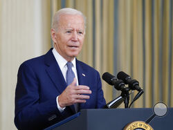 President Joe Biden speaks from the State Dining Room of the White House in Washington, Friday, Sept. 3, 2021, on the August jobs report. (AP Photo/Susan Walsh)