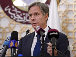 US Secretary of State Antony Blinken, speaks during a joint press conference with Secretary of Defense Lloyd Austin, Qatari Deputy Prime Minister and Foreign Minister Mohammed bin Abdulrahman al-Thani, and Qatari Defense Minister Khalid Bin Mohammed Al-Attiyah, at the Ministry of Foreign Affairs in Doha, Qatar, Tuesday, Sept. 7, 2021. (Olivier Douliery/Pool Photo via AP)