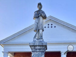 This Oct. 19, 2021, photo shows a Confederate monument in front a county courthouse in Nottoway County, Va. Voters will cast ballots in a November referendum on whether to relocate this monument to Confederate soldiers that has stood in front of the county courthouse since 1893. It is a few miles from Fort Pickett. (AP Photo/Robert Burns)