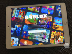 The gaming platform Roblox is displayed on a tablet, Saturday, Oct. 30, 2021 in New York. To the dismay of millions of children -- and the parents trying to keep them busy and cope with their anguish -- the popular gaming platform crashed Friday, Oct. 29, and the company was still trying to restore service Saturday. (AP Photo/Leon Keith)