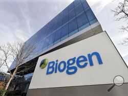 FILE - The Biogen Inc., headquarters is shown March 11, 2020, in Cambridge, Mass. Medicare's “Part B” outpatient premium will jump by $21.60 next year, one of the largest increases ever. Medicare officials told reporters on Friday, Nov. 12, 2021, that about half the increase is attributable to contingency planning if the program has to cover Aduhelm, a new $56,000-a-year medication for Alzheimer's disease made by Biogen. (AP Photo/Steven Senne, File)