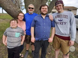 This photo provided by Nancy Sack shows Carter Lange, Kim Gustavson, Jason Lange, Matthew Gustavson and Travis Gustavson. Nancy Sack's grandson, Travis Gustavson, died at age 21 in Mankato after overdosing on what he thought was heroin but was actually laced with fentanyl.(Katie Tettam /Nancy Sack via AP)
