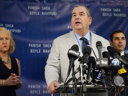 Randi McGinn, from left, Brian Panish and Jesse Creed, attorneys for the family of the late cinematographer Halyna Hutchins, take part in a news conference, Tuesday, Feb. 15, 2022, in Los Angeles. The family is suing Alec Baldwin and the movie producers of "Rust" for wrongful death, the attorneys said Tuesday. (AP Photo/Chris Pizzello)