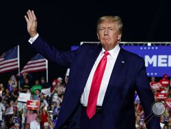 FILE - Former President Donald Trump arrives at a rally, Aug. 5, 2022, in Waukesha, Wis. Trump backed lots of Republicans who won primaries this year. Now comes the harder part, helping them win in November. Trump heads to Wilkes-Barre, Pennsylvania, on Saturday for his first rally of the general election. His goal: bolstering two struggling campaigns that show the challenges facing the inexperienced and oftentimes polarizing candidates Trump championed. (AP Photo/Morry Gash, File)