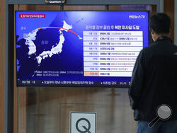 A TV screen showing a news program reporting about North Korea's missile launch, is seen at the Seoul Railway Station in Seoul, South Korea, Tuesday, Oct. 4, 2022. North Korea on Tuesday fired an intermediate-range ballistic missile over Japan for the first time in five years, forcing Japan to issue evacuation notices and suspend trains, as the North escalates tests of weapons designed to strike regional U.S. allies. (AP Photo/Lee Jin-man)