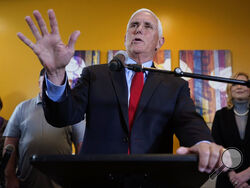 Former Vice President Mike Pence speaks during a parents rights rally Wednesday, Feb. 15, 2023, in Cedar Rapids, Iowa. (AP Photo/Charlie Neibergall)