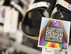 Pride month merchandise is displayed at the front of a Target store in Hackensack, N.J., Wednesday, May 24, 2023. Target is removing certain items from its stores and making other changes to its LGBTQ+ merchandise nationwide ahead of Pride month after an intense backlash from some customers including violent confrontations with its workers. (AP Photo/Seth Wenig)
