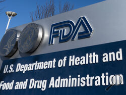 FILE - A sign for the Food and Drug Administration is displayed outside their offices in Silver Spring, Md., on Dec. 10, 2020. The first gene therapy for Duchenne muscular dystrophy received preliminary U.S. approval on Thursday, June 22, 2023, despite concerns from some government scientists about the treatment's ability to help boys with the inherited disease. (AP Photo/Manuel Balce Ceneta, File)