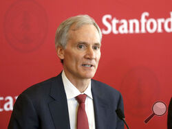 Marc Tessier-Lavigne speaks to the media at Stanford University in Stanford, Calif., on Feb. 4, 2016. Tessier-Lavigne, the president of Stanford University said Wednesday, July 19, 2023, he would resign, citing an independent review that cleared him of research misconduct but found flaws in other papers authored by his lab. Tessier-Lavigne said in a statement to students and staff that he would step down Aug. 31. (Patrick Tehan/Bay Area News Group via AP)