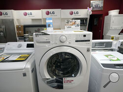 File - Washing machines are displayed at Sam's Appliances TV & Furniture, on March 25, 2021, in Norwood, Mass. On Thursday, the Labor Department reports on U.S. consumer prices for July. Economists expect the report to show prices rose 3.3%. (AP Photo/Steven Senne, File)