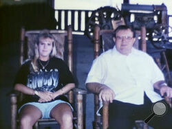 FILE - In this photo taken sometime in the early 2000s provided by Kymberly Hobbs, Hobbs poses next to her brother, Charles Givens. The Virginia Department of Corrections, under scrutiny over the death of inmate Givens in a case that has raised wider concerns about conditions at a southwest Virginia prison, is refusing Wednesday, Aug. 9, 2023, to release public records documenting inmate complaints about the facility. (Courtesy of Kymberly Hobbs via AP, File)