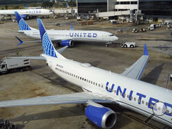 FILE - A United Airlines plane is pushed from the gate at George Bush Intercontinental Airport, Aug. 11, 2023, in Houston. United Airlines flights were halted nationwide on Tuesday, Sept. 5, because of an “equipment outage,” according to the Federal Aviation Administration. (AP Photo/David J. Phillip, File)