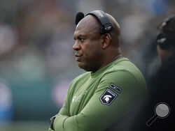 FILE - Michigan State coach Mel Tucker watches the team's NCAA college football game against Rutgers, Nov. 12, 2022, in East Lansing, Mich. A Michigan State University hearing officer has determined that former coach Tucker sexually harassed rape survivor and activist Brenda Tracy, a person familiar with the ruling told The Associated Press on Wednesday, Oct. 25. The hearing officer ruled Tucker was in violation of several terms of his contract, according to the person, who spoke on condition of anonymity b