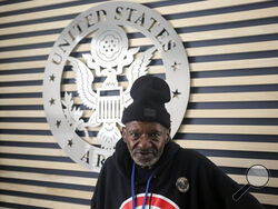 In this photo provided by Gabriella Rico, Vietnam War-era Army veteran Harold Tilson Jr., stands in a room on the campus of the Veterans Empowerment Organization in Atlanta, Nov. 10, 2023. Tilson was homeless earlier in the year, but has spent the past three months in transitional housing at VEO and hopes to next year have a place of his own to live. (Gabriella Rico via AP)