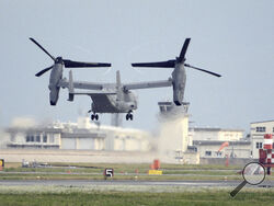 FILE - A U.S. military CV-22 Osprey takes off from Iwakuni base, Yamaguchi prefecture, western Japan, on July 4, 2018. Japanese and American military divers have spotted what could be the remains of a U.S. Air Force Osprey aircraft that crashed last week off southwestern Japan and several of the six crewmembers who are still missing, local media reported Monday, Dec. 4, 2023. (Kyodo News via AP, File)