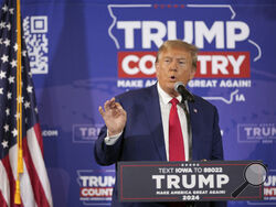 FILE - Former President Donald Trump speaks during a Commit to Caucus rally, Saturday, Dec. 2, 2023, in Ankeny, Iowa. Experts in political messaging say former President Donald Trump’s remarks that his supporters must “guard the vote” in 2024 are potentially dangerous and could lead to confrontations at polling place. (AP Photo/Matthew Putney, File)