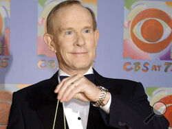 FILE - Tom Smothers does yo-yo tricks during arrivals at CBS's 75th anniversary celebration Sunday, Nov. 2, 2003, in New York. Tom Smothers, half of the Smother Brothers and the co-host of one of the most socially conscious and groundbreaking television shows in the history of the medium, has died, Tuesday, Dec. 26, 2023 at 86. (AP Photo/Louis Lanzano, File)