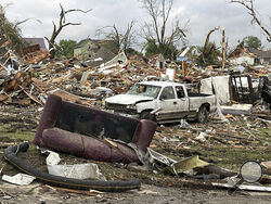 (AP Photo/Hannah Fingerhut) Damage is seen after a tornado moved through Greenfield, Iowa, Tuesday, May 21, 2024. 
