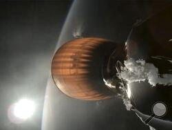 This image from video provided by SpaceX shows the upper stage engine of a SpaceX Falcon 9 rocket, which blasted off from California on Thursday, July 11, 2024. The rocket, carrying 20 Starlink satellites, malfunctioned during the blast, leaving the company’s internet satellites in a precariously low orbit. (SpaceX via AP)