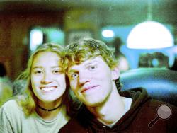 In this Sept. 1, 2017 photo provided by Matthew Westmoreland, Riley Howell, right, is seen. Authorities say Howell, 21, was killed after he tackled a gunman who opened fire in a classroom at the University of North Carolina-Charlotte. Police said a few students, including Howell, died and several others were injured. Charlotte-Mecklenburg Police Chief Kerr Putney said Howell's actions likely saved the lives of other students. (Matthew Westmoreland via AP)